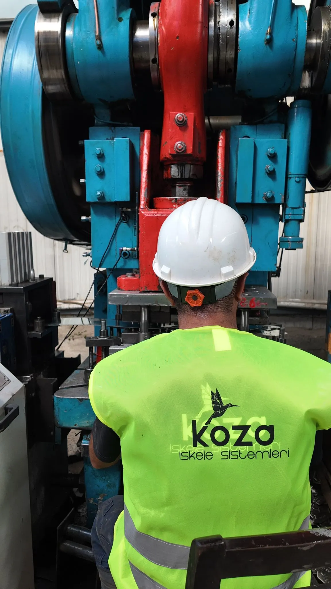 KOZA team member working in production